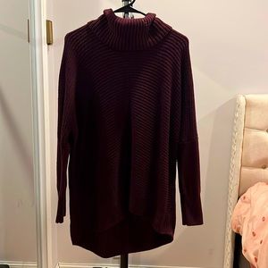 High low cable knit sweater.